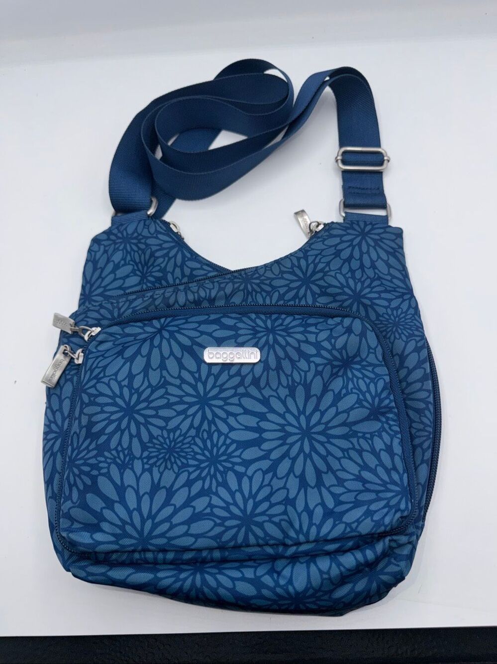BAGGALLINI Turquoise Floral Criss Cross Crossbody Bag